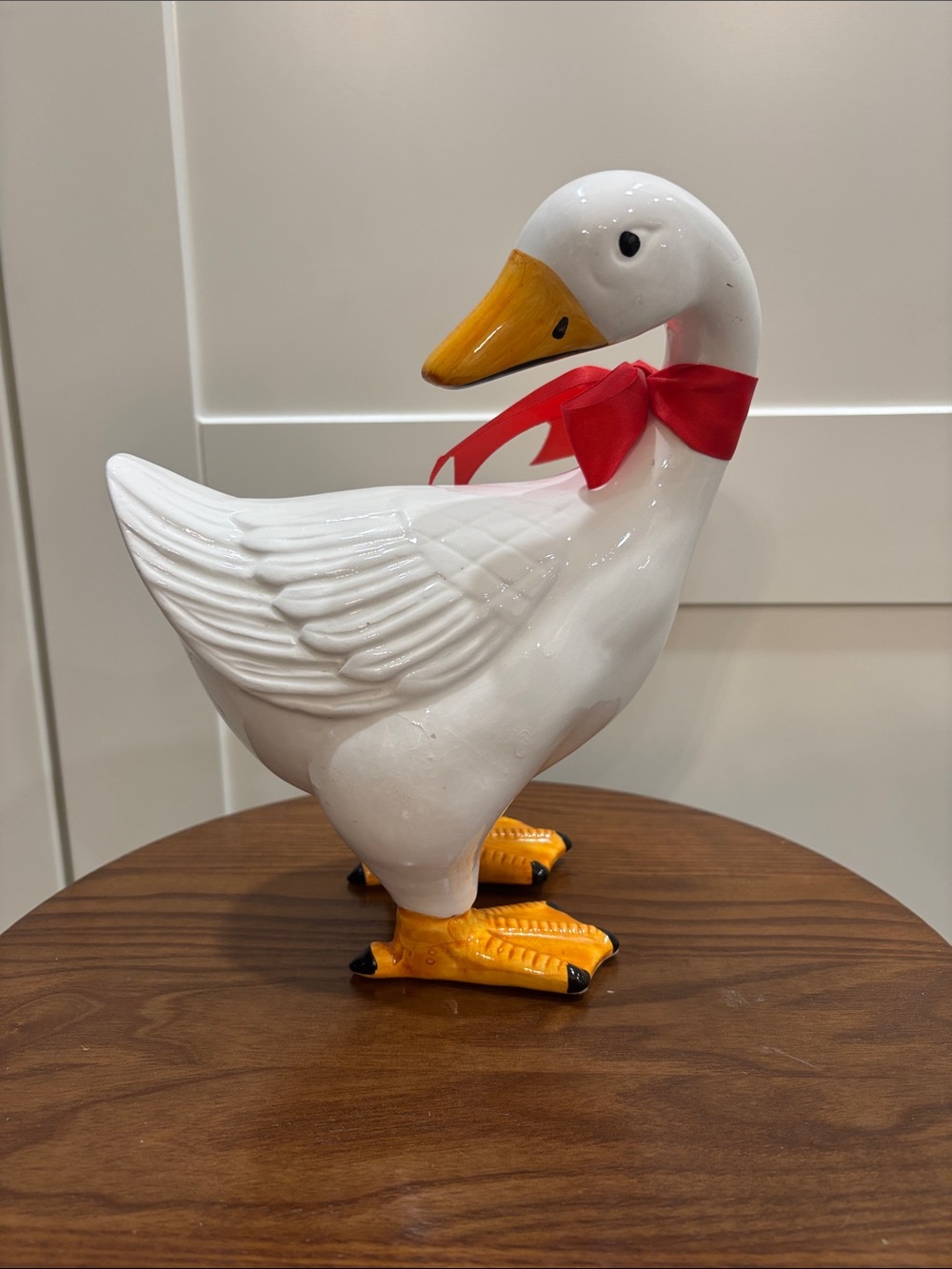 White Ceramic Duck Figurine with Red Bow